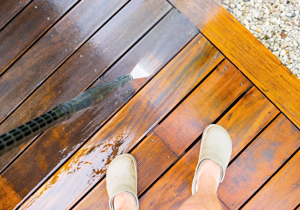 Can pressure washing remove graffiti?