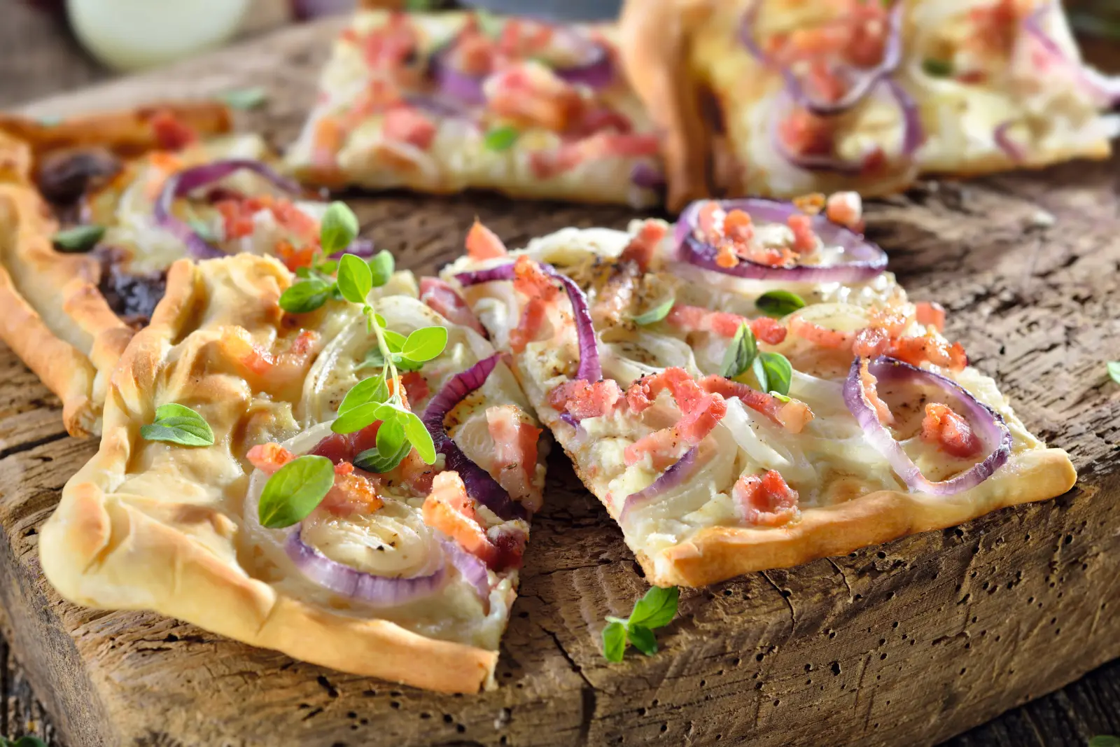 Alsatian tarte flambée with onions and bacon image