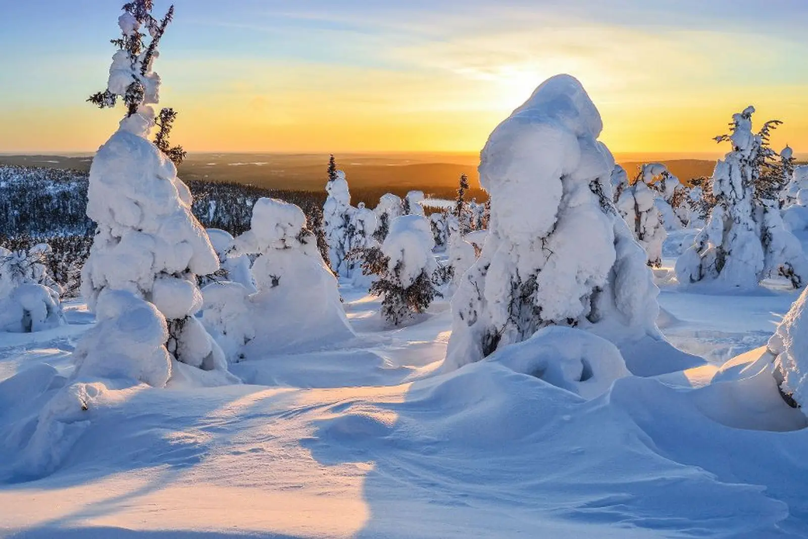 Snow-covered mountains in Lapland image