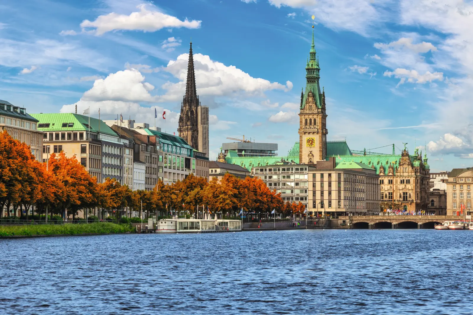 View of Hamburg with the town hall and the Binnenalster in autumn.