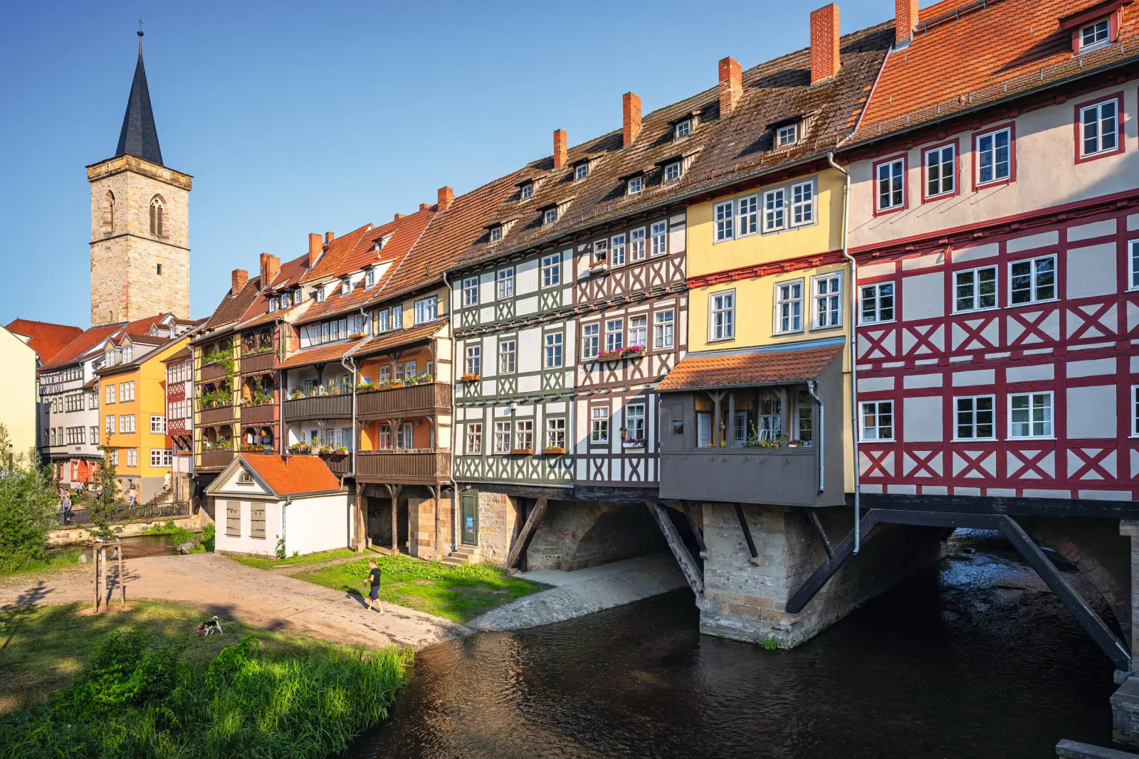 Half-timbered houses on a bridge over a river in Erfurt.