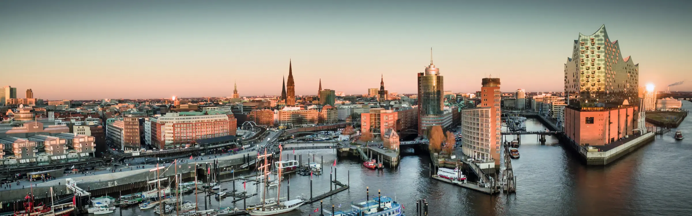 Panoramic view of Hamburg's HafenCity at sunset.