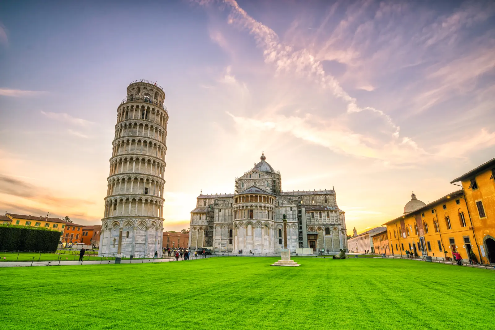 The Leaning Tower of Pisa at sunset in Italy.