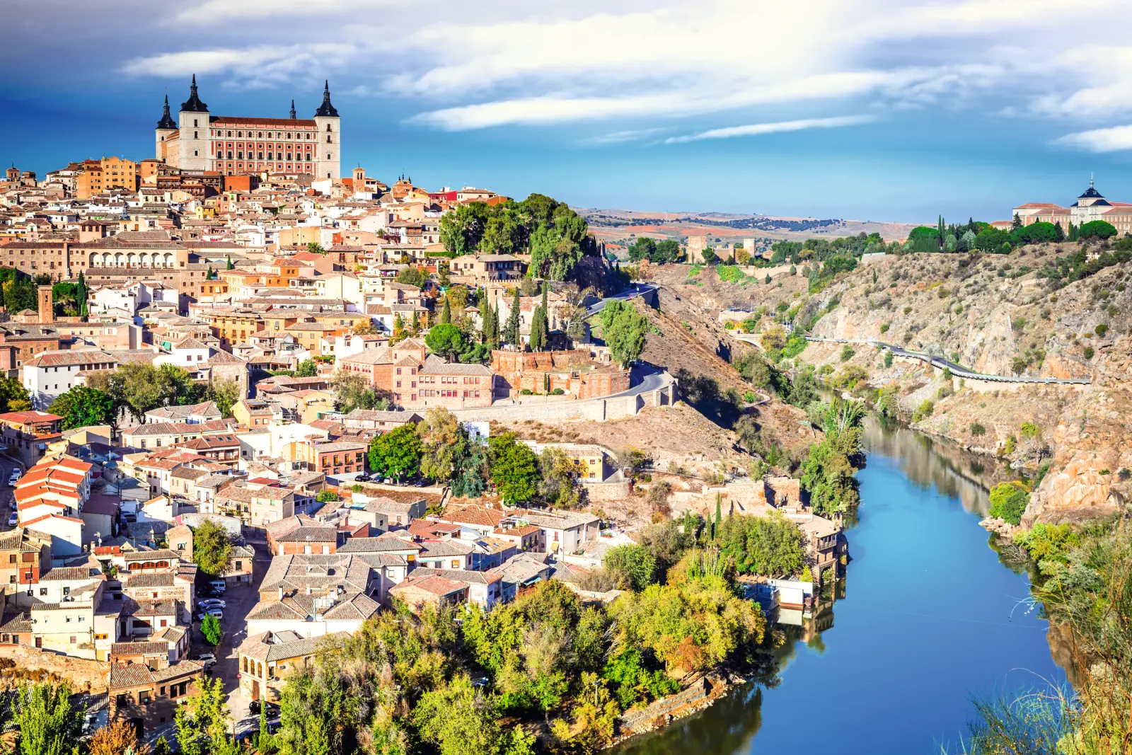 View of Toledo in Spain with the river and castle in the background.
