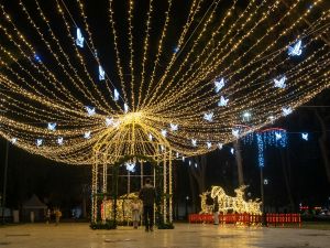 Can I combine holiday and year-round lighting in one system?