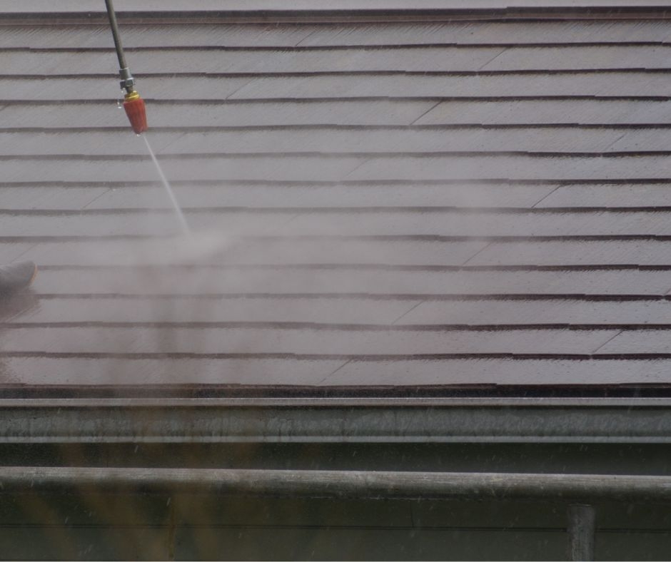 How do you handle hazardous debris during gutter cleaning?