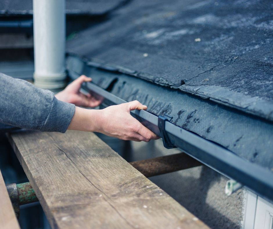 What can obstruct gutters and cause damage?