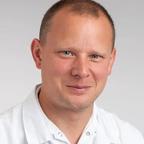 Dr. Christof Bollmann, chirurgien de la main à Lausanne