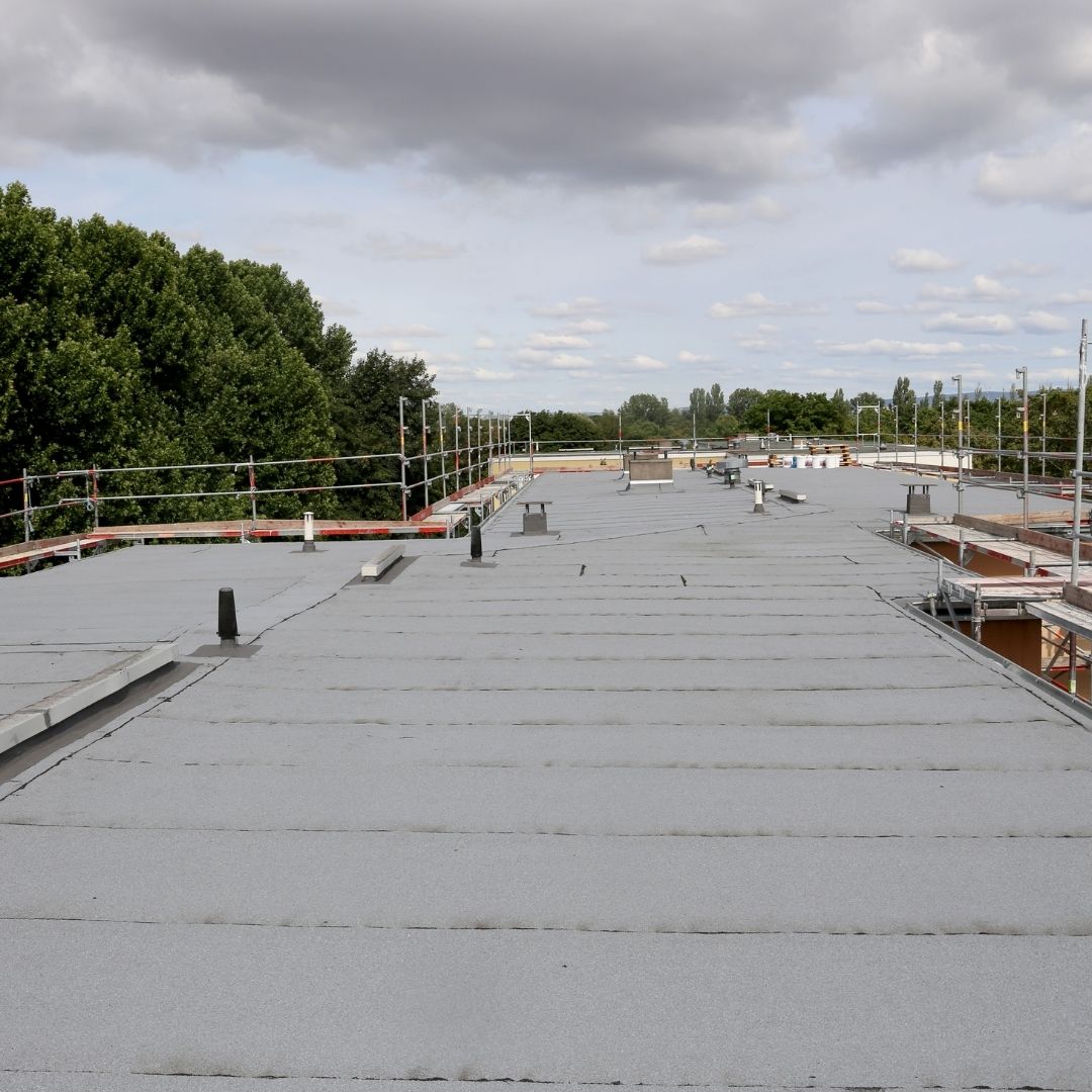 Do they provide roof replacement services with warranties?